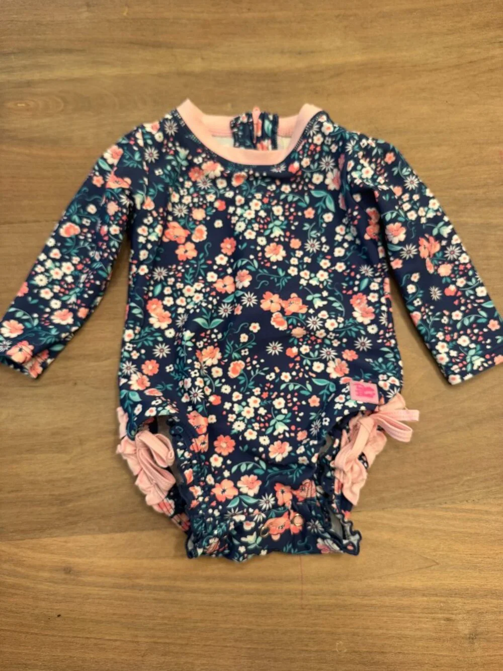 RuffleButts Navy Floral Long-Sleeve Rash Guard Swimsuit